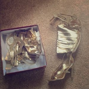 Gold knee high gladiator heels